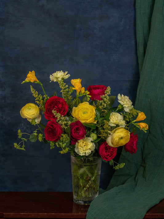 The Emerald arrangement set in a permanent vase from Adore Flowers
