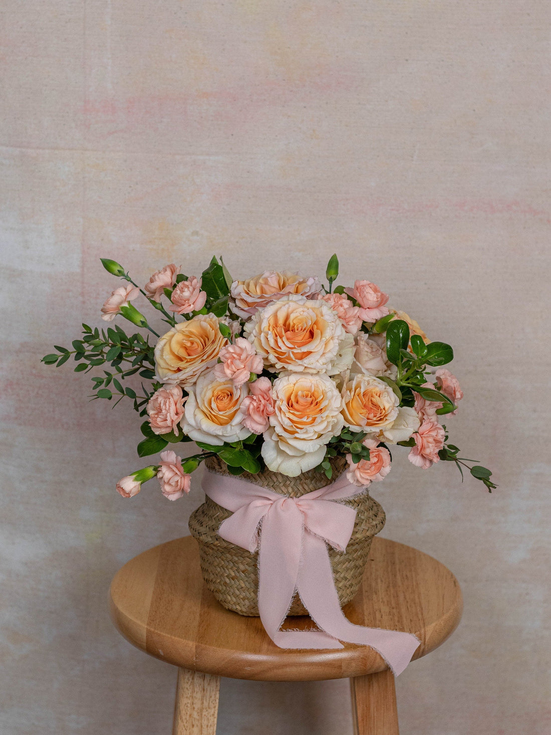 The Charm basket, a bright hand-designed arrangement from Adore Flowers