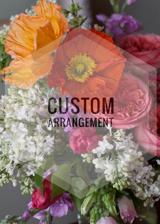 A custom designed floral arrangement by Adore Flowers