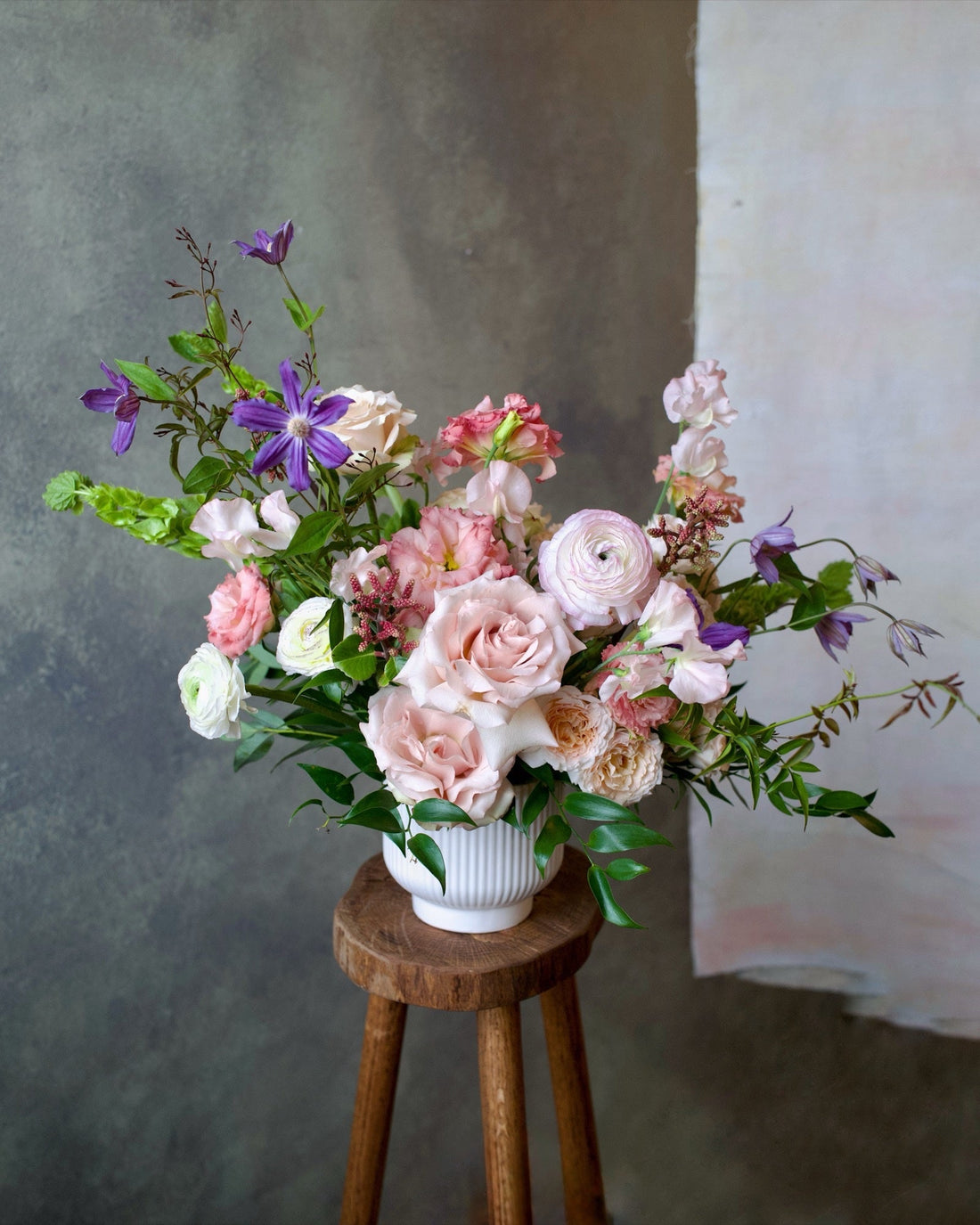 Delicate Blushes arrangement in a stone vase, blush and cream garden flowers built for same-day delivery, Adore Flowers, Los Angeles