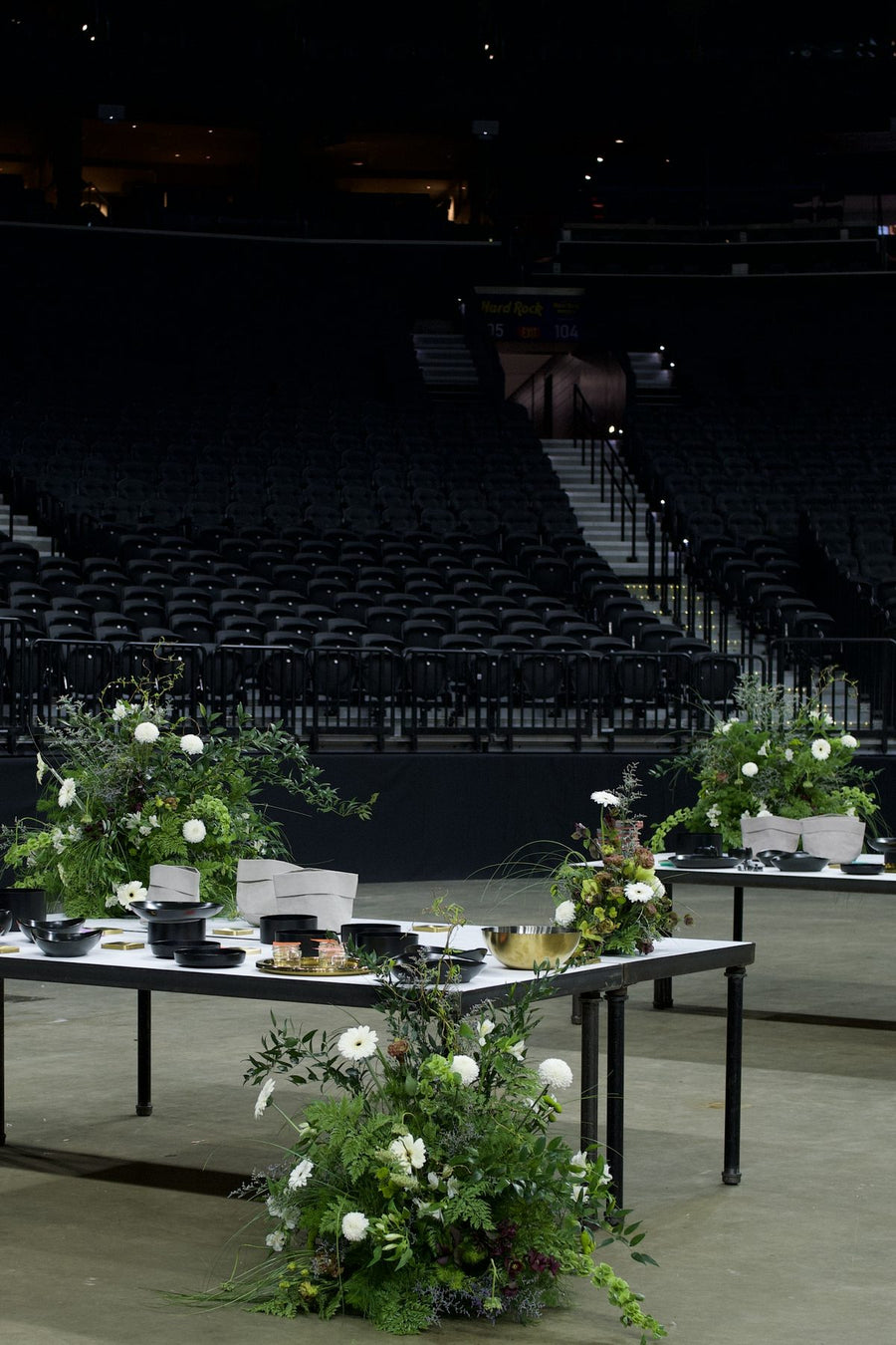 Dramatic red and burgundy gala centerpiece on a banquet table, by Adore Flowers, Los Angeles