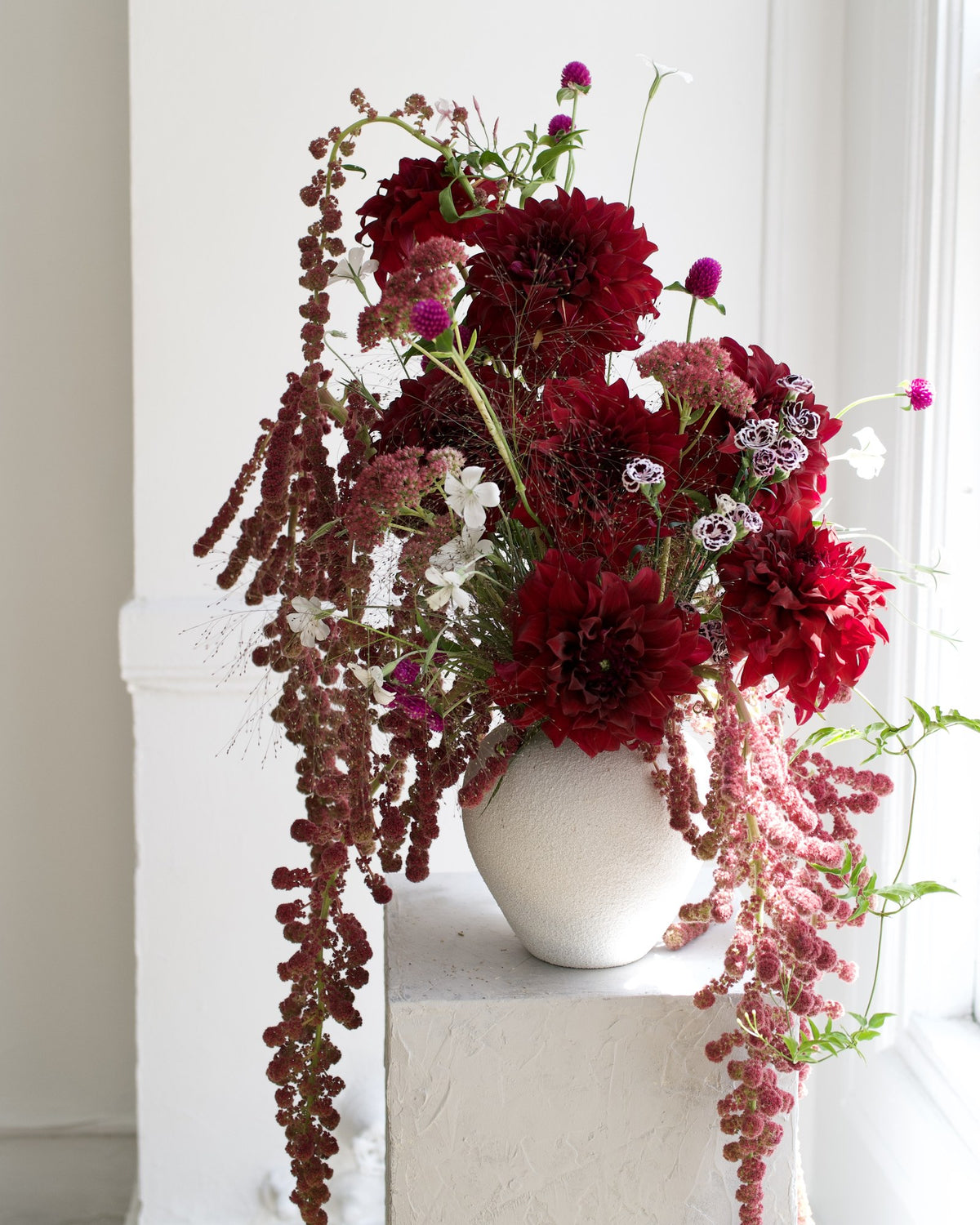 Bold & Moody vase arrangement, burgundy dahlias, pink globe amaranth and trailing amaranthus in a white ceramic vase, Adore Flowers Los Angeles