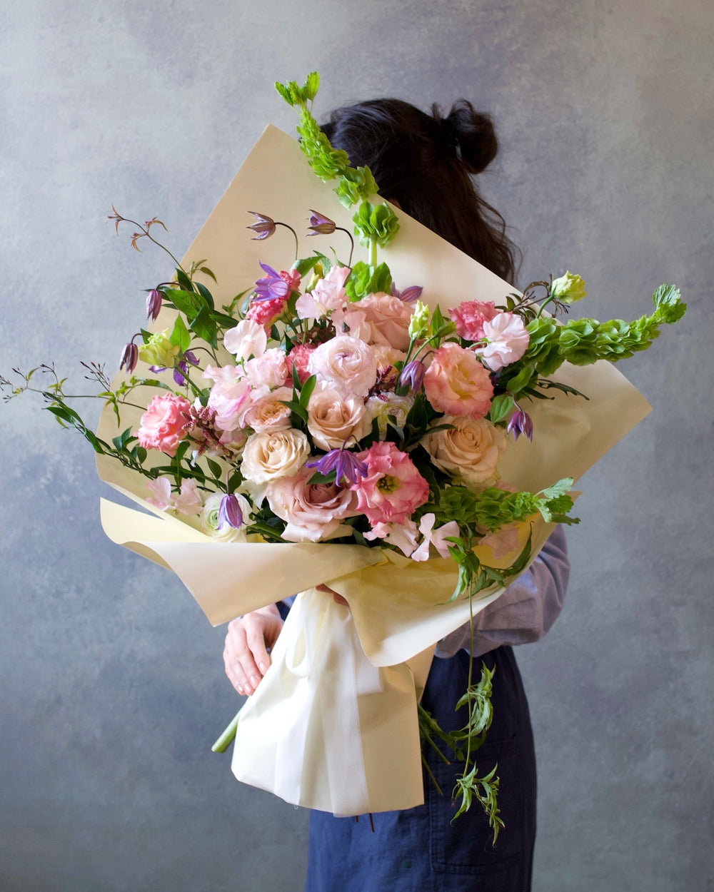Delicate Blushes bouquet, soft pink roses, ranunculus and lisianthus hand-tied in wrap, Adore Flowers Los Angeles