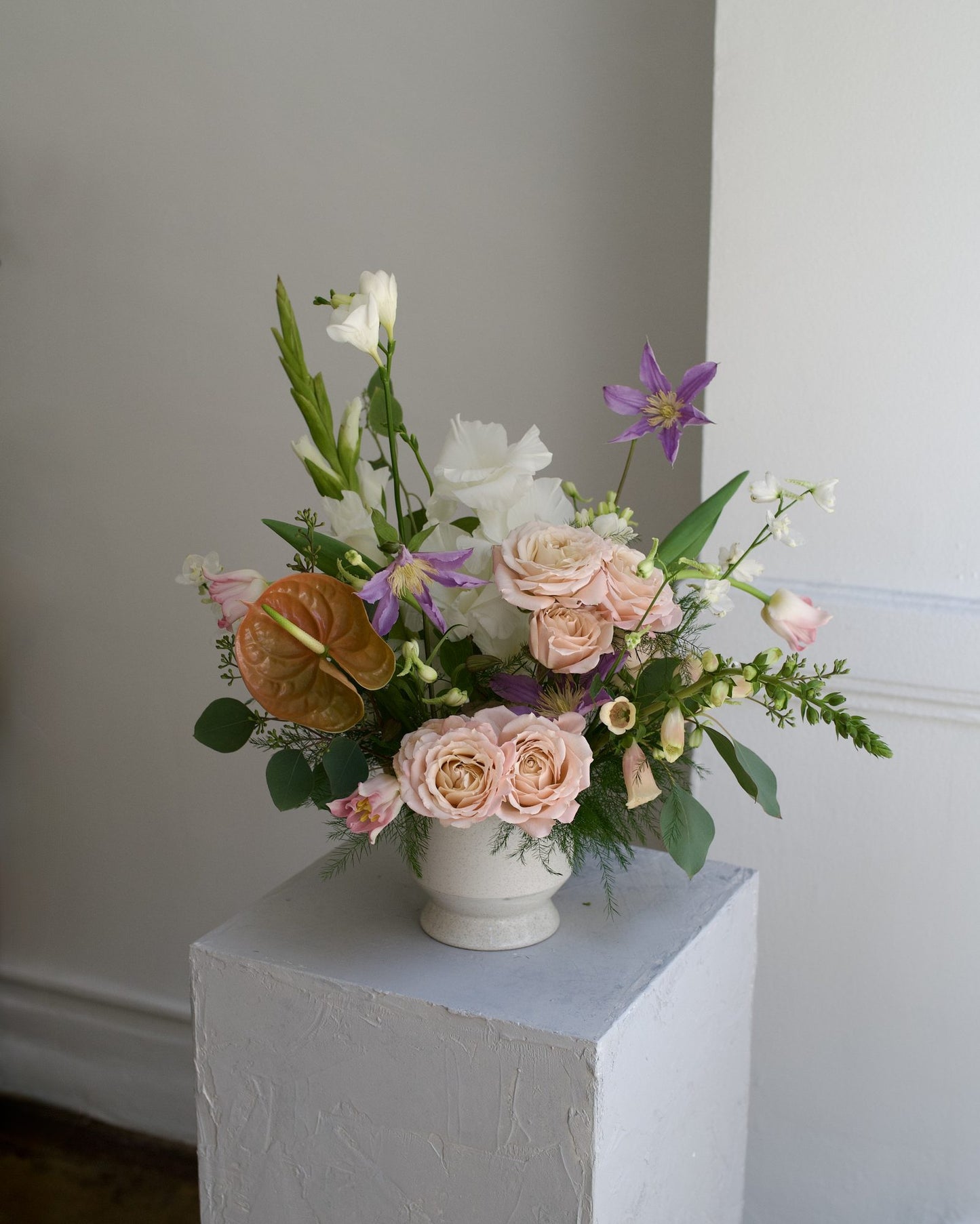 Delicate Blushes vase arrangement, blush garden roses, purple clematis and anthurium in a ceramic vase, Adore Flowers Los Angeles