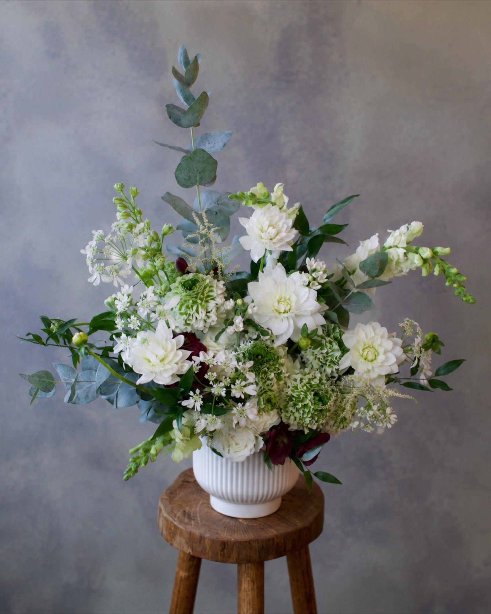 Earthy Neutrals arrangement in a stone vase, white and green garden flowers, same-day delivery Los Angeles